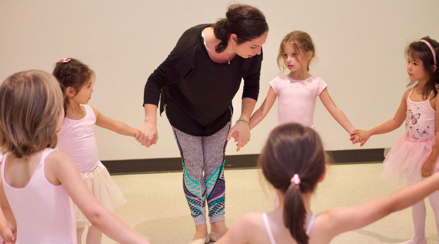 Students participating in a ballet after school class